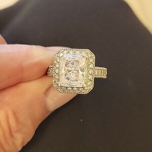 14kt. White gold and cubic zirconia ring...beautiful halo setting